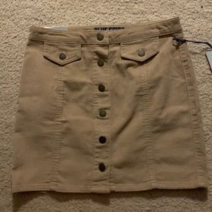 Adorable high waisted corduroy tan skirt. Size 7 NWT